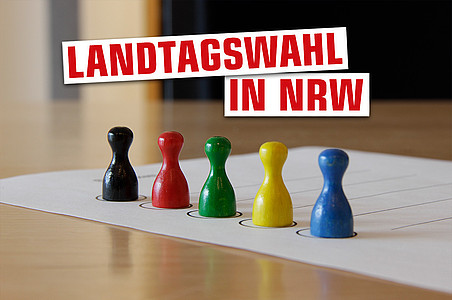 Bunte Spielfiguren mit Aufschrift "Landtagwahl in NRW"